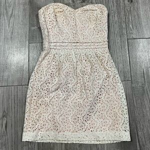 Urban Outfitters white strapless lace dress with pink underlay